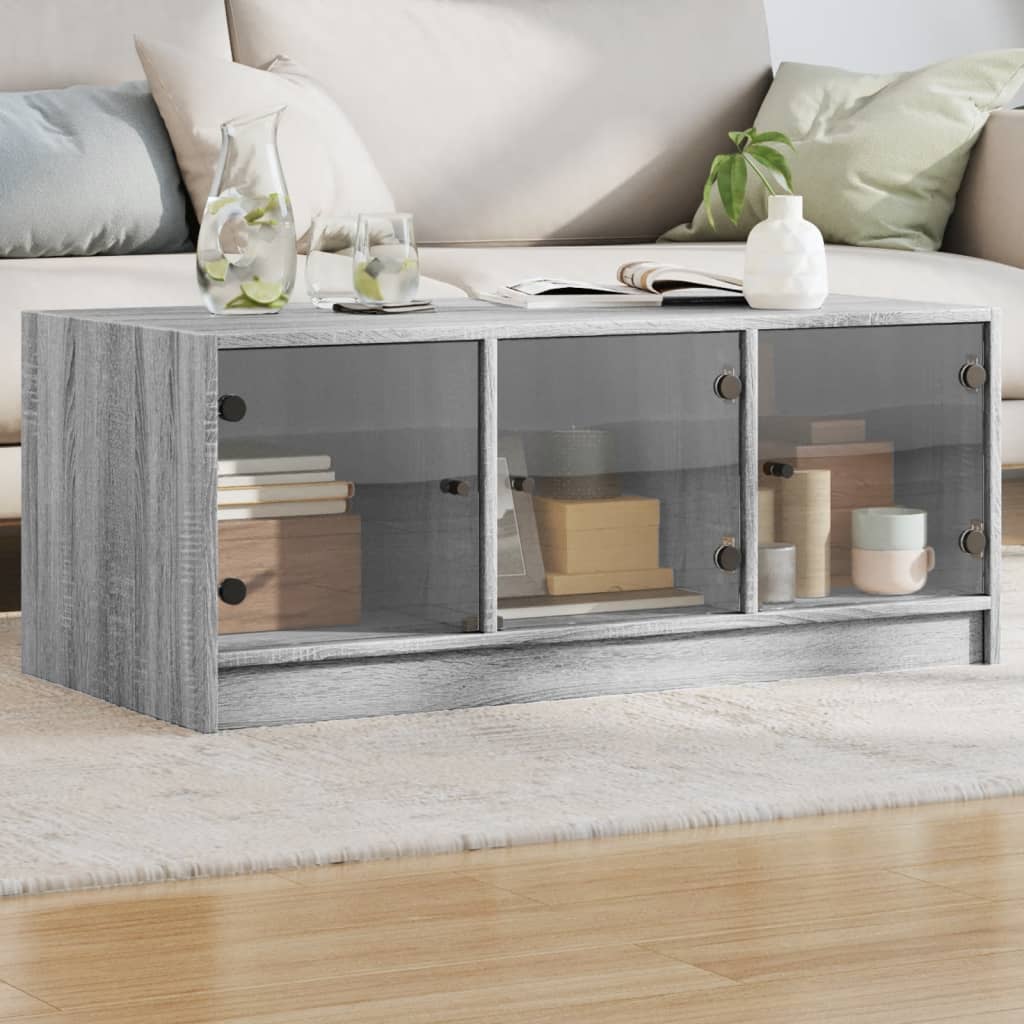 Coffee Table with Glass Doors Grey Sonoma 102x50x42 cm - Brittle & Co