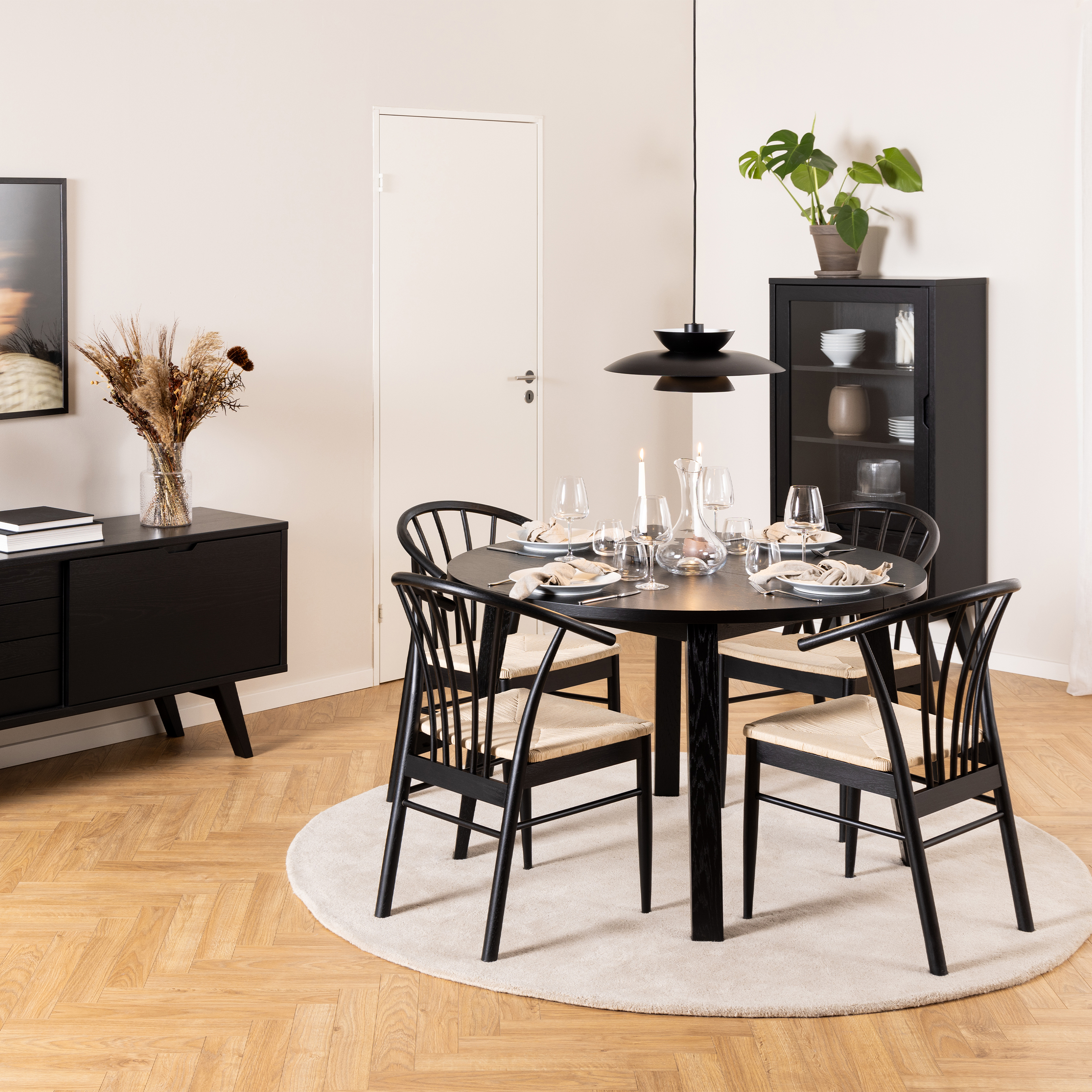 MONTA Round Extending Dining Table in Black Included 4 Dining Chair with Armrest in Black - Rosalind Collection