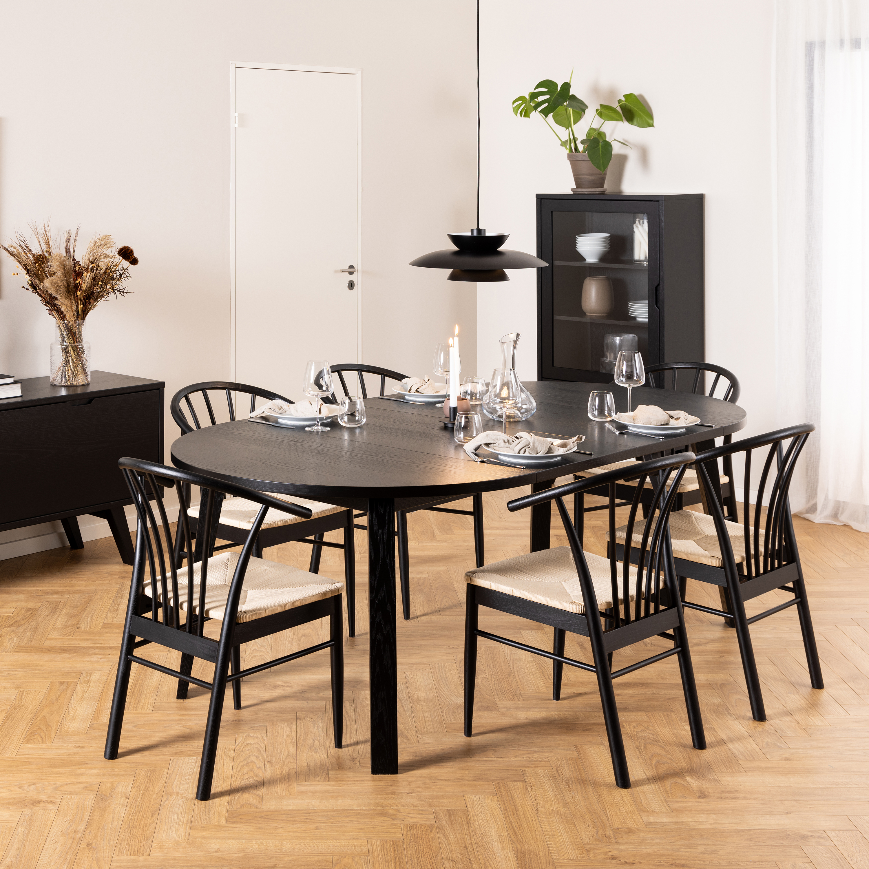 MONTA Round Extending Dining Table in Black Included 6 Dining Chair with Armrest in Black - Rosalind Collection