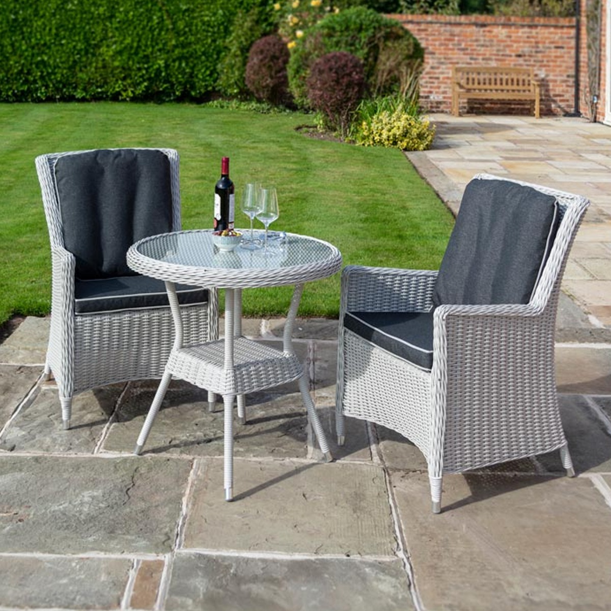 Prestbury Rattan Effect Weave Three Piece Bistro Set with Cushions and Seat Pads - Etta Gardens